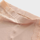 Nude floral half slip shorts