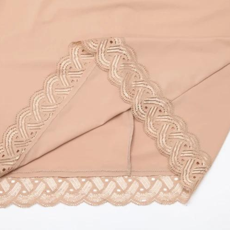 Nude shaping slip under the dress